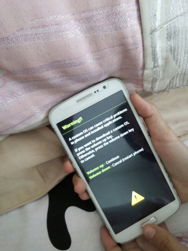 三星手机 一直重复开关机 第一个图片的样子一